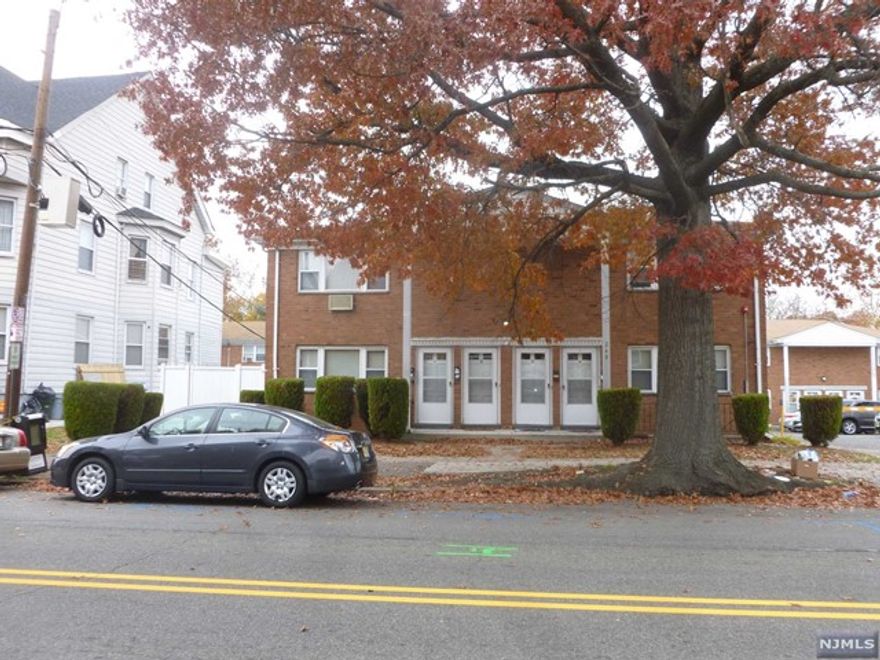 One Bedroom Apartment 1st floor unit. Hardwood flooring. Includes Heat, hot water, cooking gas. One assigned parking space. coin laundry on premise. Also includes Refrigerator and one wall a/c.