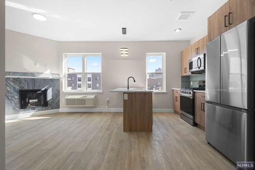 *** NO FEE RENTAL *** Introducing The 212 - Your New Home! These boutique luxury apartments in the heart of Guttenberg offer an unparalleled living experience. Offering one and two bedroom units, including limited number of Loft units with NYC skyline views! This new construction building is just 2 short blocks off Blvd East, providing an effortless commute to NYC and close proximity to local restaurants and shopping. Each apartment boasts hardwood floors, custom closets, granite countertops, and state-of-the-art appliances. The energy-efficient heat as you go water heating system, in-unit washer dryer, fireplace, and heated bathroom floors ensure comfort and convenience. Additionally, every home is pre-wired for internet access and includes custom blinds, along with the added benefit of a garage parking space, with an EV station available. The building itself features a video intercom system, elevator, and package room, offering residents modern convenience and peace of mind!