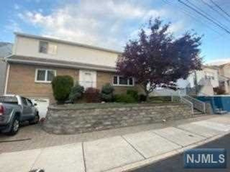 Large 2nd floor apartment on residential street close to Ridge St & Washington School. Available January 1, 2023.