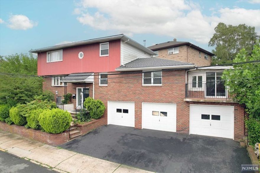 Very Spacious and bright 1st floor unit of 2-family home. Entire unit is renovated. Big eat-in kitchen. Large living room. New gas oven, dishwasher, and in-unit washer/dryer. Access to one car garage with driveway space. Great location