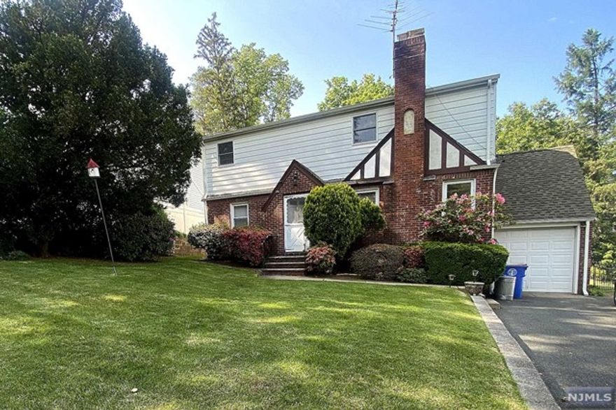 SPACEOUS FOUR BEDROOM THREE FULL BATHROOM HOME IN THE HEART OF TENAFLY. CLOSE TO SCHOOLS AND SHOPPING.