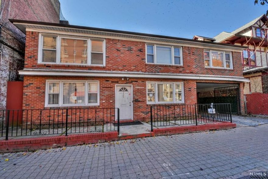 Welcome to 225 60th Street where this free standing, mixed use building boasts an ideal location in the heart of West New York. It is the perfect opportunity for investors and business owners with a strong foundation for entrepreneurial ventures. The first floor of this property is currently setup with a waiting room, office space, 4 examination rooms with sinks, a half bath and a cubby for a lab. The generously sized second floor offers 4 large bedrooms, 3 full baths, a spacious living room, dining room and kitchen. This property provides 5+ parking spaces in the back of the building. Considering its prime location, amenities and extensive livable area, this mixed use building is an exceptional opportunity for those who wish to make their mark in West New York. Secure your future success by scheduling a showing today!