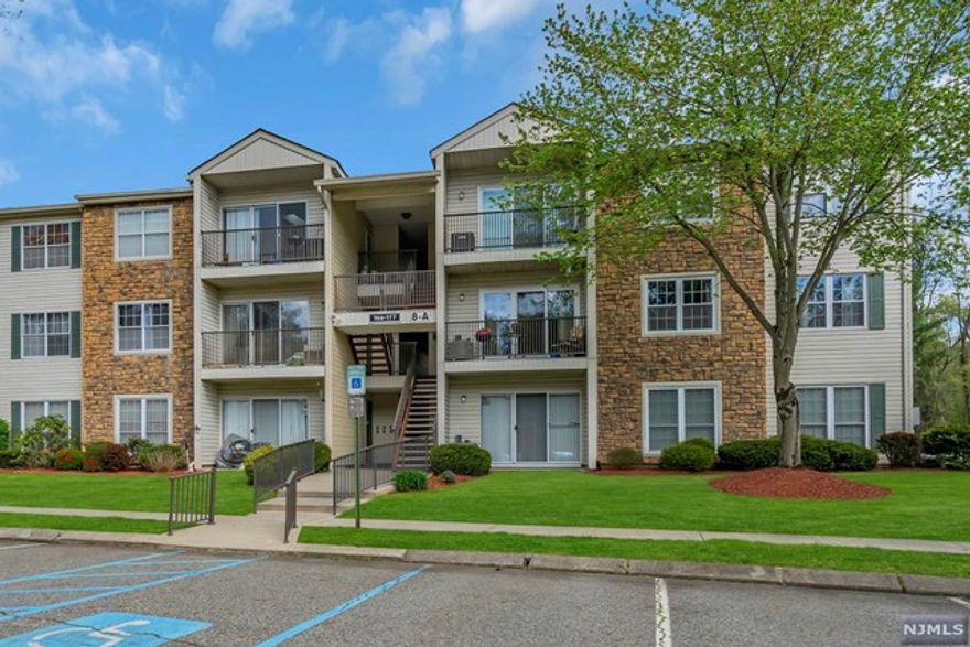 This charming condo boasts 2 large bedrooms & 2 full bathrooms, perfect for those seeking privacy w/ the added convenience of community living. As you step inside, you'll be greeted by a freshly painted & well-maintained space w/ beautiful wood flooring throughout.The spacious living room features sliding doors that open to a private balcony, offering stunning views of the surrounding woodland. Imagine enjoying your morning coffee or winding down in the evening while taking in the serene ambiance of nature. The primary bedroom offers an en-suite bathroom w/ brand new glass doors & a spacious walk-in closet. Woodland Hills community offers a range of amenities, including a clubhouse, pool, and playground, all designed to enhance your living experience. Low maintenance means you can spend less time worrying about upkeep & more time enjoying the things you love.Conveniently located close to shopping, major highways, & NYC transportation, this condo offers easy access to everything!