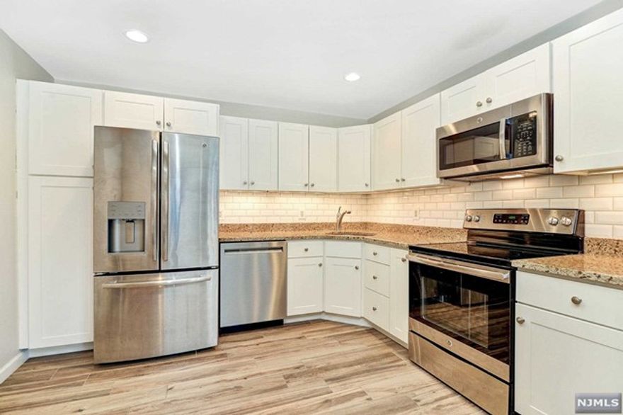 Light and bright 2 bedroom 1 bathroom end unit with balcony located in desirable Darlington Ridge! Newly updated eat in kitchen with stainless steel appliances. Brand new flooring, Newly updated large bathroom, walk in closet in 2nd bedroom, in unit washer/dryer, new furnace. One street from community pool. Community amenities include: pool, clubhouse, playground, and tennis court. Top rated schools! Two entrance options to unit one with no stairs for easy accessibility. No Smoking, smaller pet may be considered. Renters insurance required. Unit comes with 1 assigned parking space. Pictures are prior to current tenant.