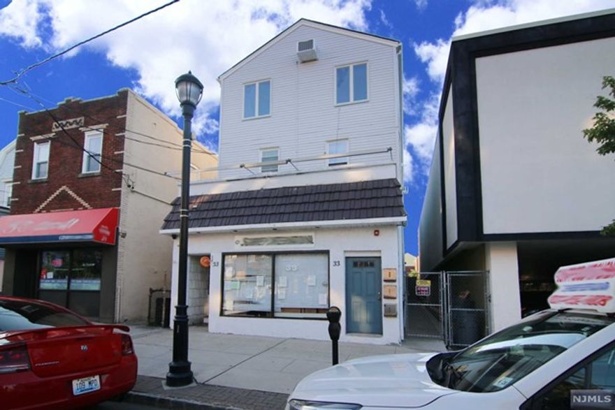 Welcome to our beloved North Arlington & 33 Ridge Rd! If a good investment is what you're looking for, research this property! Located in a prime N Arlington Location w/ 4 units: 3 apartments & a Store w/ 1,785 Sq Ft plus a full basement. Store is suitable for many uses, located next to a municipal parking lot. W/ 5,125 SF of above ground space, you have room to expand plant & grow roots. The 3rd fl apartment boosts 1,671 SF + deck, w/ a great open layout, plenty of natural light, skylights, a NY City view on the front & sunsets in the back. 2nd fl features 2 apartments w/ a great design. Great income producing property w/ all separate utilities. Public transportation is a block away. Be sure to peruse the 3D Virtual Tour & the detailed floor plans for each level. Want to run some numbers? Just ask us for a report. With a monthly income of $8,850 you can get as much as 17.15% ROI on a 7-year hold, & %11.27 cash-on-cash year 1. All LED lighting throughout. It's a Solid Investment!