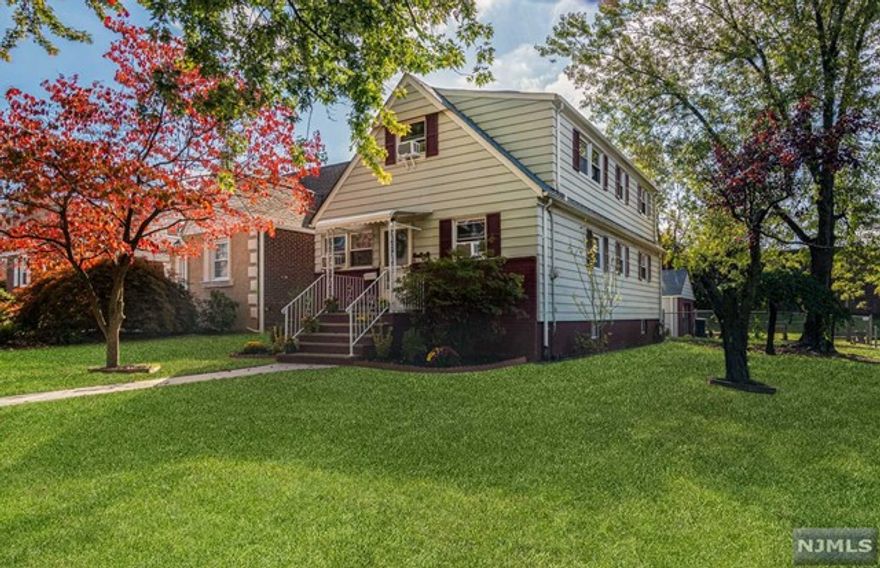 Beautiful, fully renovated corner lot Cape in desirable section of Hackensack! Features 4bdrms, 2 full bath, L/R and EIK with granite countertops and LG S/S Appliances and so much more. Original and newly installed hardwood floors throughout with large finished bsmt. New roof and some new windows. The garage also has a new roof with newly installed windows and garage door. Midea U Smart window a/c units installed in 5 rooms in the home, specs will be uploaded. Beautiful landscaping with a park and playground directly behind the home for YOUR enjoyment. Close to schools, shopping, restaurants, places of worship and transit with Express bus to Manhattan just one block away.