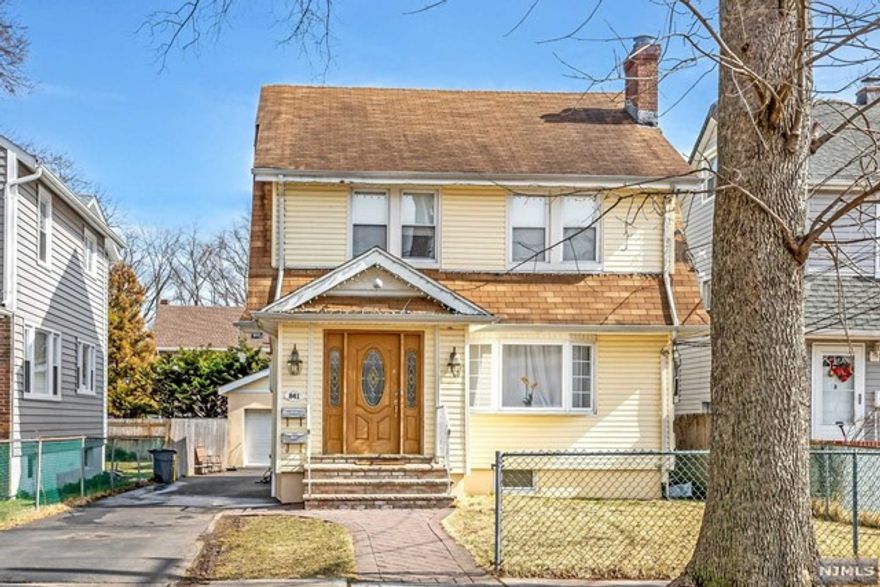 Updated 1st floor 2-bedroom 2-bathroom unit with private yard, 2 car garage and finished basement. Unit features entry foyer, bright living/dining room with wood burning fireplace, updated kitchen with quartz countertops and stainless-steel appliances, 2 spacious bedrooms, full bathroom and mud room with access to yard. lower level features a recreational room, guest room, office, full bathroom, laundry hook up as well as utility room and storage. Access yard and 2 Car detached garage belongs exclusively to lower unit. Close to NYC bus, shopping, parks and houses of worship. Unit will be freshly painted, and laundry will be installed prior to occupancy.