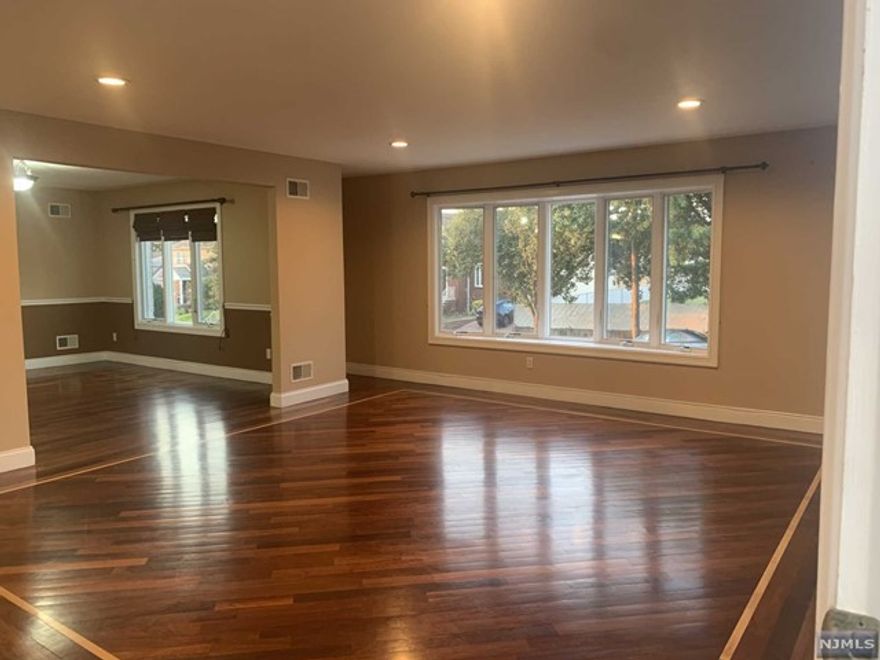 Welcome to a commuter's dream with Westmont station only 1 Mile away!! This Spectacular 2,200 square foot apartment offers 3 bed 2 bath, a spacious open plan living area. Hardwood floors through out, Living room, dinning room, gorgeous kitchen with granite counter tops. Stainless steel appliances, Central air. A stunning master suite with a large walk-in closet, featuring his and hers sink, a bathtub, and standing shower. A laundry room, extra storage , Garage for 1 car plus 2 spaces in the driveway. Enjoy the summer barbeques in the backyard!! Close to school, transportation, major highways and easy commute to NYC. Don't miss out this opportunity call for your showing today!!