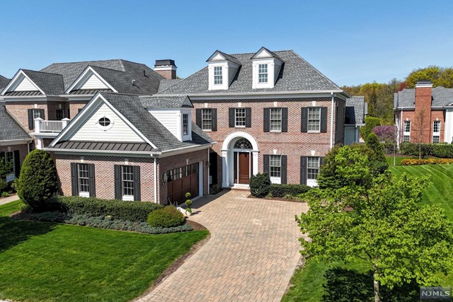 WELCOME TO 105 CORTLAND DRIVE AT PRESTIGIOUS SADDLE RIVER GRAND. A LUXURIOUS JAMESTOWN II MODEL WITH 3 BEDROOM AND 4.5 BATHS. OPEN FLOOR PLAN WITH BEAUTIFUL CROWN MOULDINGS, WAINSCOTTING AND HARDWOOD FLOORS THROUGHOUT THE FIRST FLOOR. GREAT ROOM WITH MARBLE FIREPLACE, FORMAL DINING RM. A CHEF'S DREAM KITCHEN WITH TOP-OF-THE-LINE APPLIANCES, CENTER ISLAND, GRANITE COUNTERS, PANTRY AND DINING AREA OVERLOOKING THE GROUNDS. LUXURIOUS FIRST FLOOR PRIMARY SUITE WITH HIS AND HER CLOSETS. MAGNIFICENT PRIMARY BATH W/WHIRLPOOL, LG STEAM SHOWER AND RADIANT HEAT. SECOND FLOOR FEATURES A LOFT WITH HARDWOOD FLOORS THAT OVERLOOKS GRAND 2 STORY FOYER. 2 ADDITIONAL BEDROOMS EN-SUITE. FINISHED LOWER LEVEL WITH KITCHENETTE, FULL BATH, UTILITY ROOM AND AMPLE STORAGE. GENERATOR HOOK-UP AND SOUND SYSTEM. AMENITIES INCLUDE GATED COMMUNITY, CLUBHOUSE AND POOL, LANDSCAPING, EXTERIOR MAINTENANCE, SNOW AND GARBAGE REMOVAL. LUXURY LIVING AT ITS BEST!