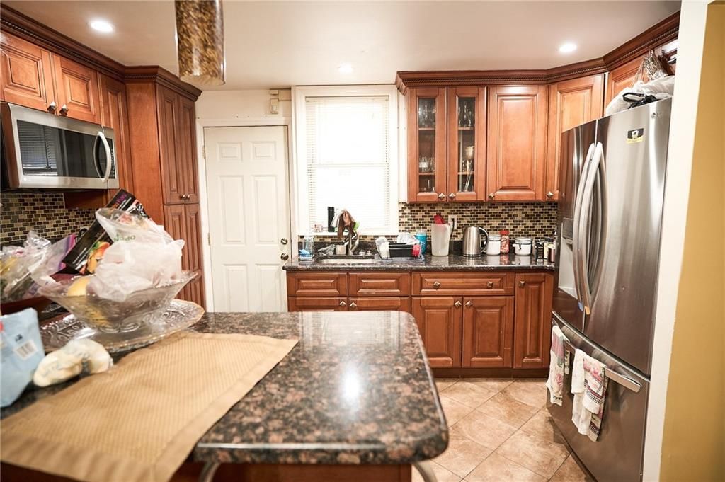 Photo of 1448 53rd Street, Brooklyn, NY 11234 (MLS # 497679)