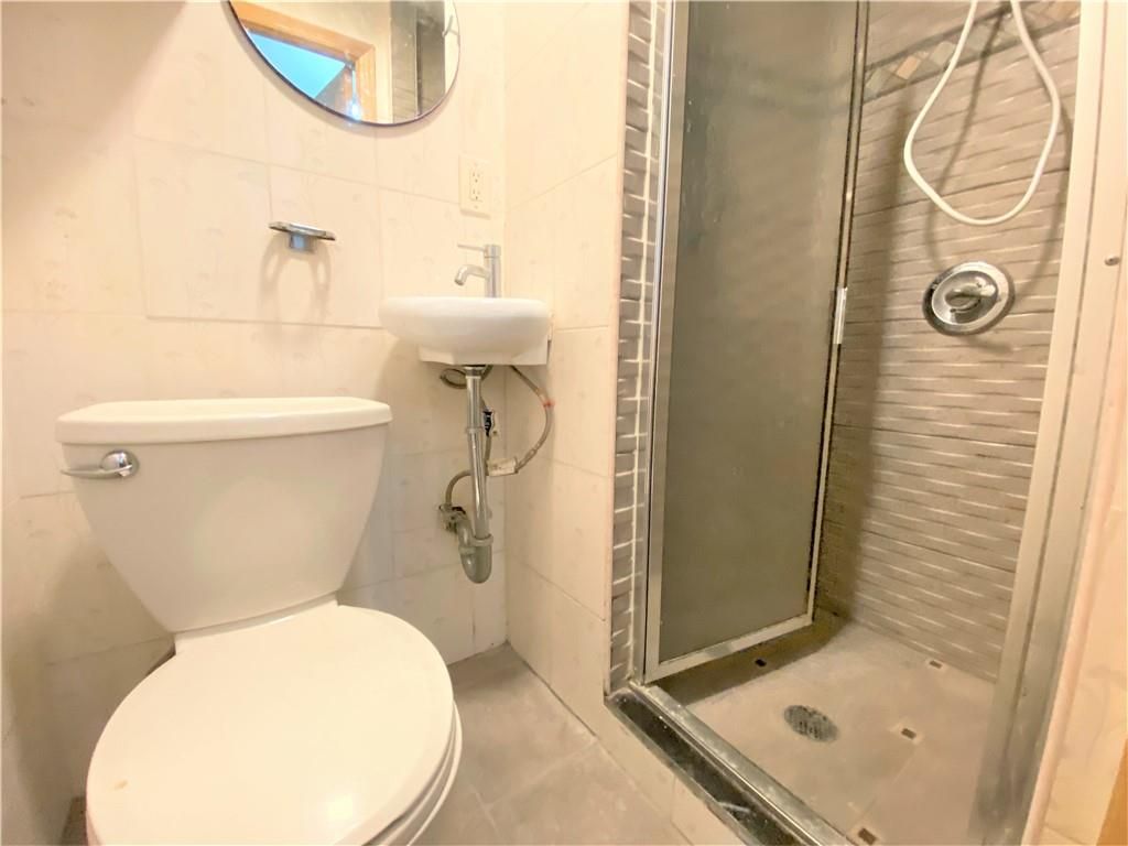 Photo of 8670 20th Avenue #2, Brooklyn, NY 11214 (MLS # 499931)