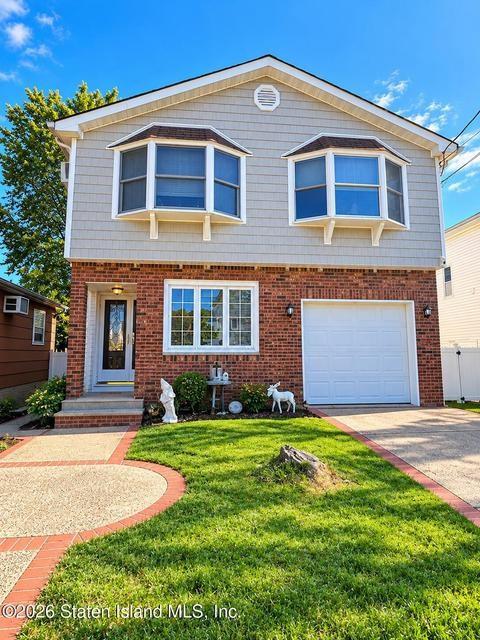 Photo of 479 Bloomingdale Road, Staten Island, NY 10309 (MLS # 505700)