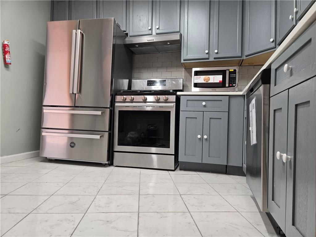 Photo of 1021 85th Street, Brooklyn, NY 11236 (MLS # 497860)