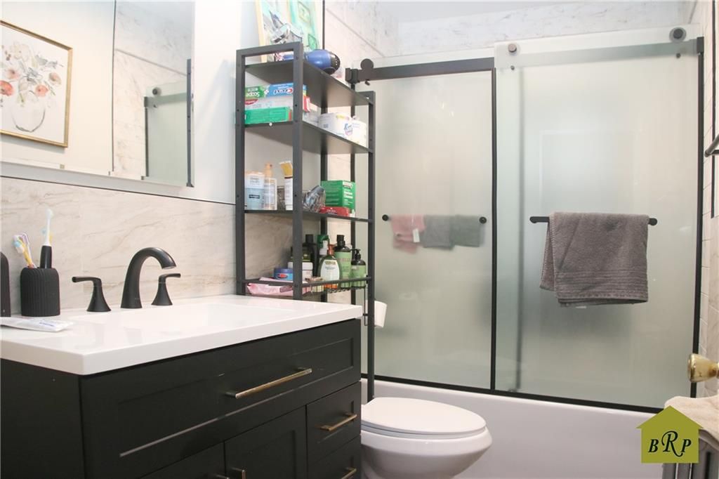 Photo of 973 32nd Street, Brooklyn, NY 11210 (MLS # 498267)