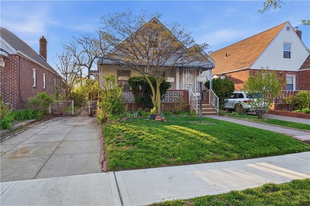 Photo of 118-34 234th Street, Cambria Heights, NY 11411 (MLS # 500872)