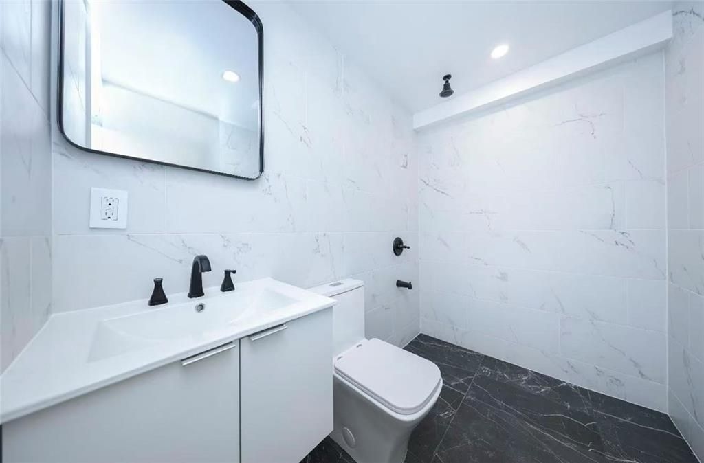 Photo of 32 Lincoln Terrace, Brooklyn, NY 11235 (MLS # 498287)