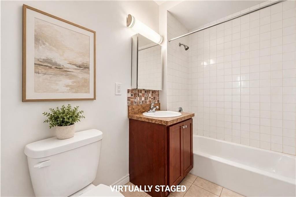 Photo of 203 Father Copodanno Boulevard, Staten Island, NY 10305 (MLS # 505027)