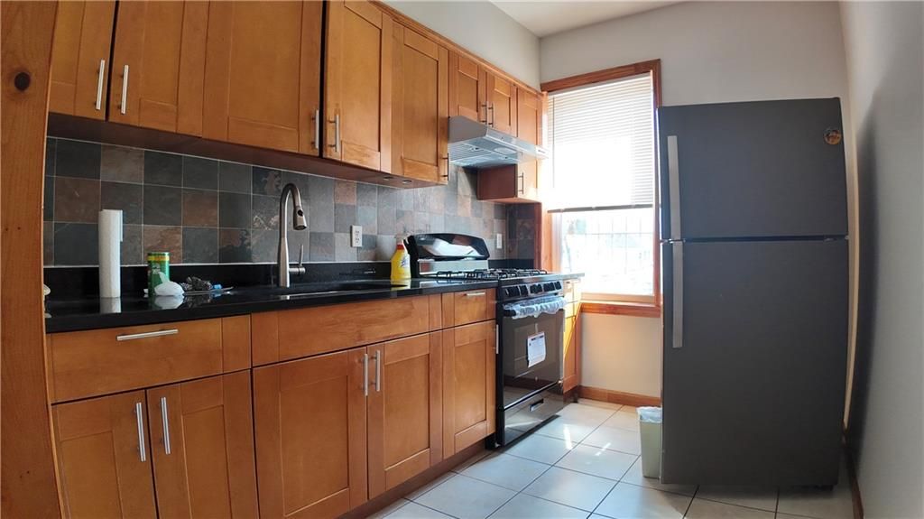 Photo of 6013 20th Avenue, Brooklyn, NY 11204 (MLS # 499824)