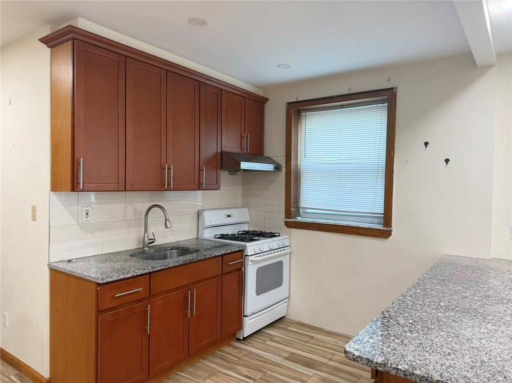 Photo of 8682 15th Avenue, Brooklyn, NY 11228 (MLS # 500940)