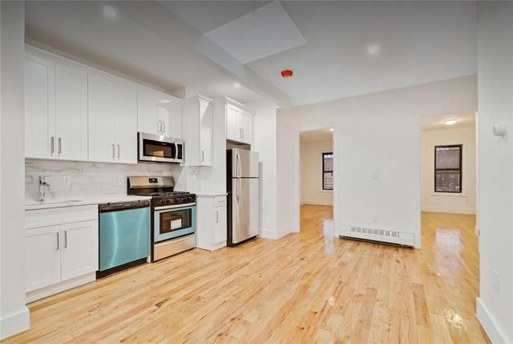 Photo of 842 Belmont Avenue, Brooklyn, NY 11208 (MLS # 499104)