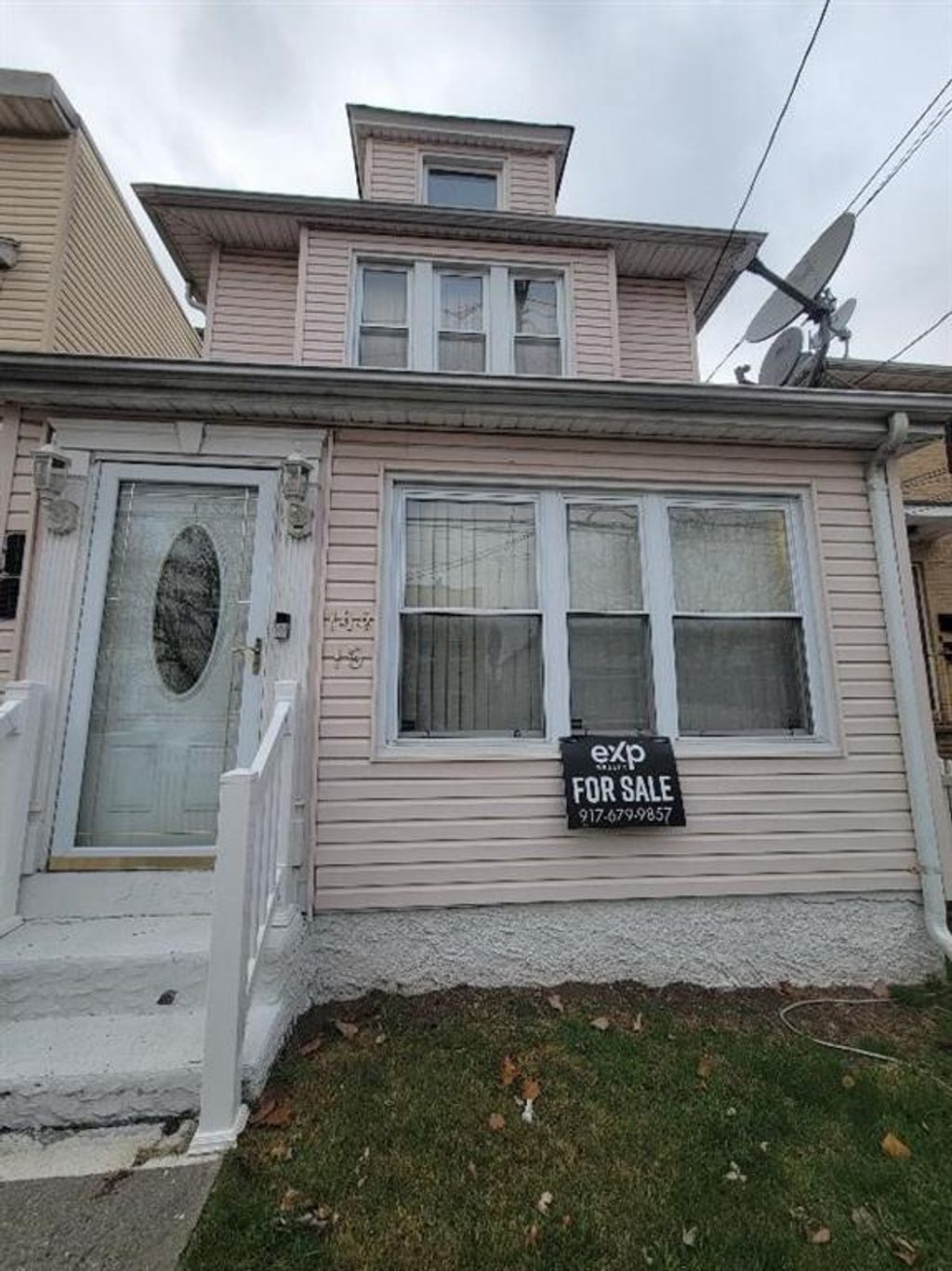 Photo of 14415 Tuskegee Airmen Way, Jamaica, NY 11435 (MLS # 499423)