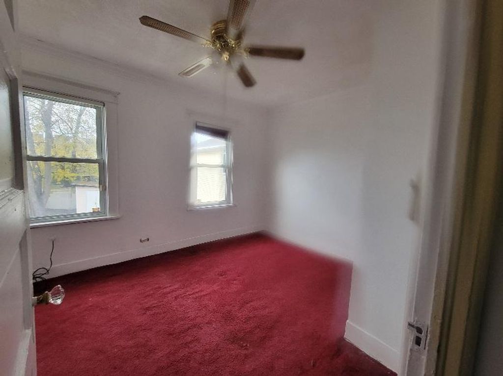 Photo of 14415 Tuskegee Airmen Way, Jamaica, NY 11435 (MLS # 499423)