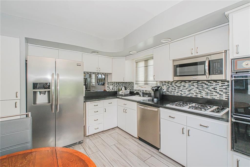 Photo of 1438 70th Street, Brooklyn, NY 11234 (MLS # 496230)