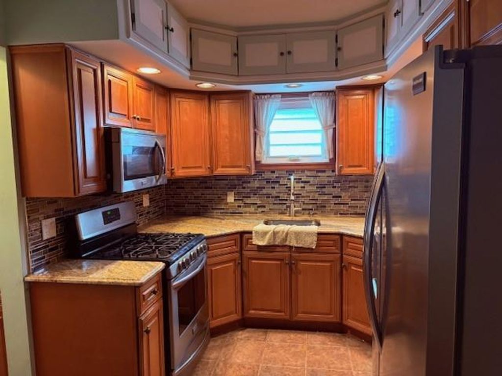 Photo of 2043 64th Street, Brooklyn, NY 11234 (MLS # 499793)