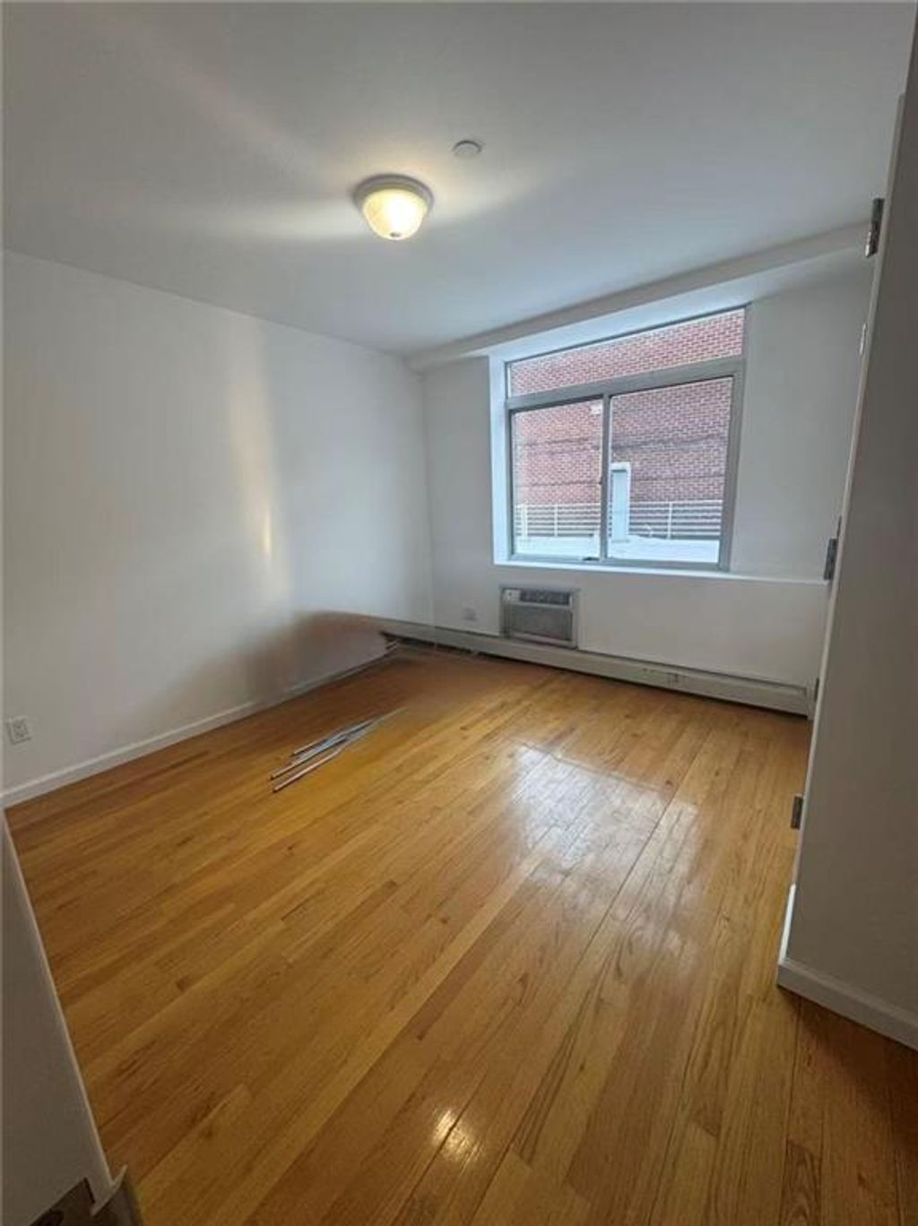 Photo of 8106 Baxter Avenue #2B, Elmhurst, NY 11373 (MLS # 499009)