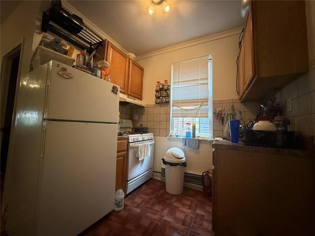 Photo of 103-04 Liberty Avenue, Ozone Park, NY 11417 (MLS # 499567)