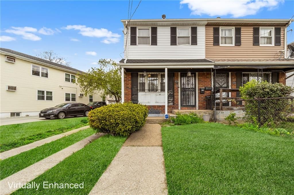 Photo of 12239 Long Street, Jamaica, NY 11434 (MLS # 501468)