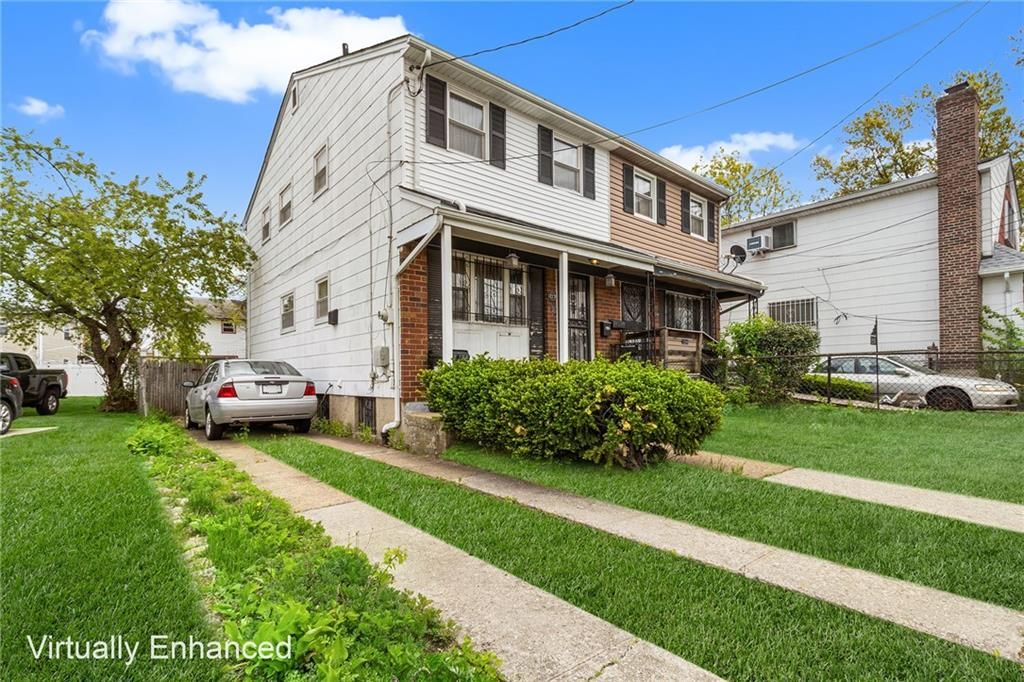 Photo of 12239 Long Street, Jamaica, NY 11434 (MLS # 501468)