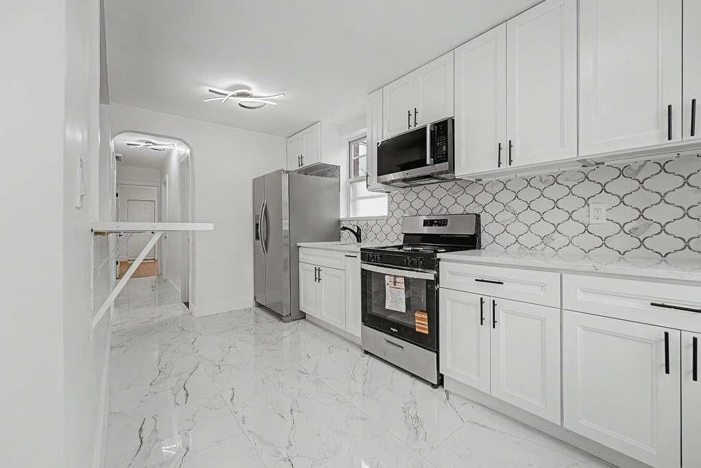 Photo of 879 57th Street, Brooklyn, NY 11234 (MLS # 500571)