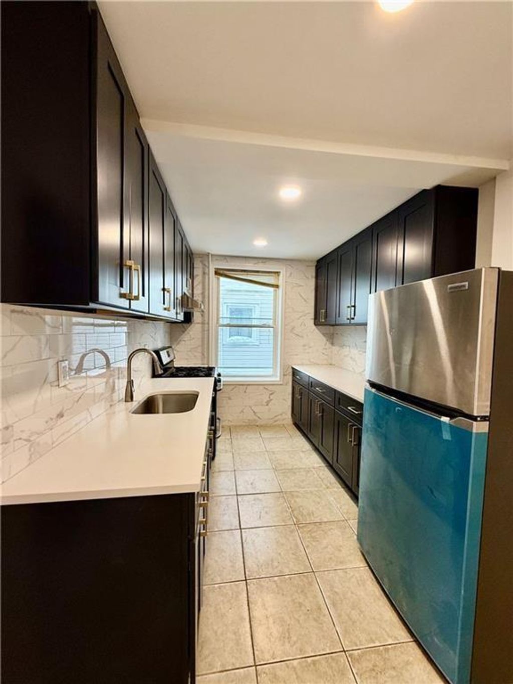 Photo of 8689 15th Avenue #1, Brooklyn, NY 11228 (MLS # 500218)