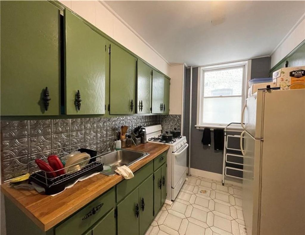 Photo of 1424 71st Street, Brooklyn, NY 11228 (MLS # 500017)