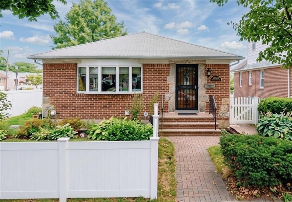 Photo of 255-03 87th Drive, Queens, NY 11001 (MLS # 502840)