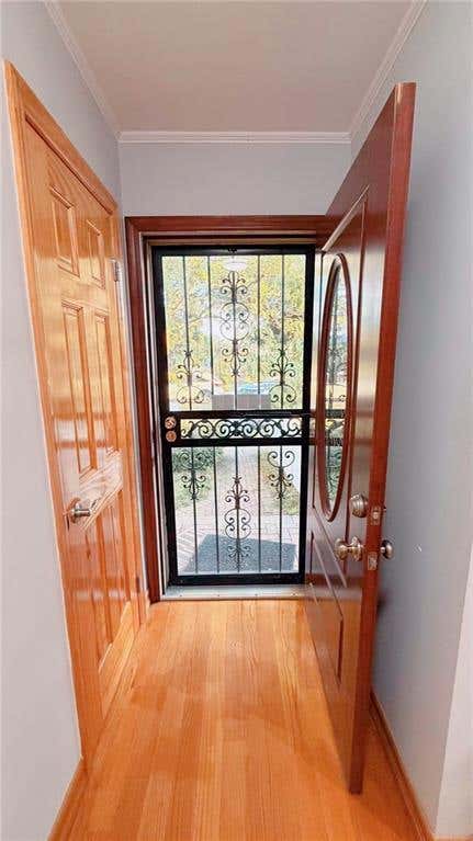 Photo of 255-03 87th Drive, Queens, NY 11001 (MLS # 502840)
