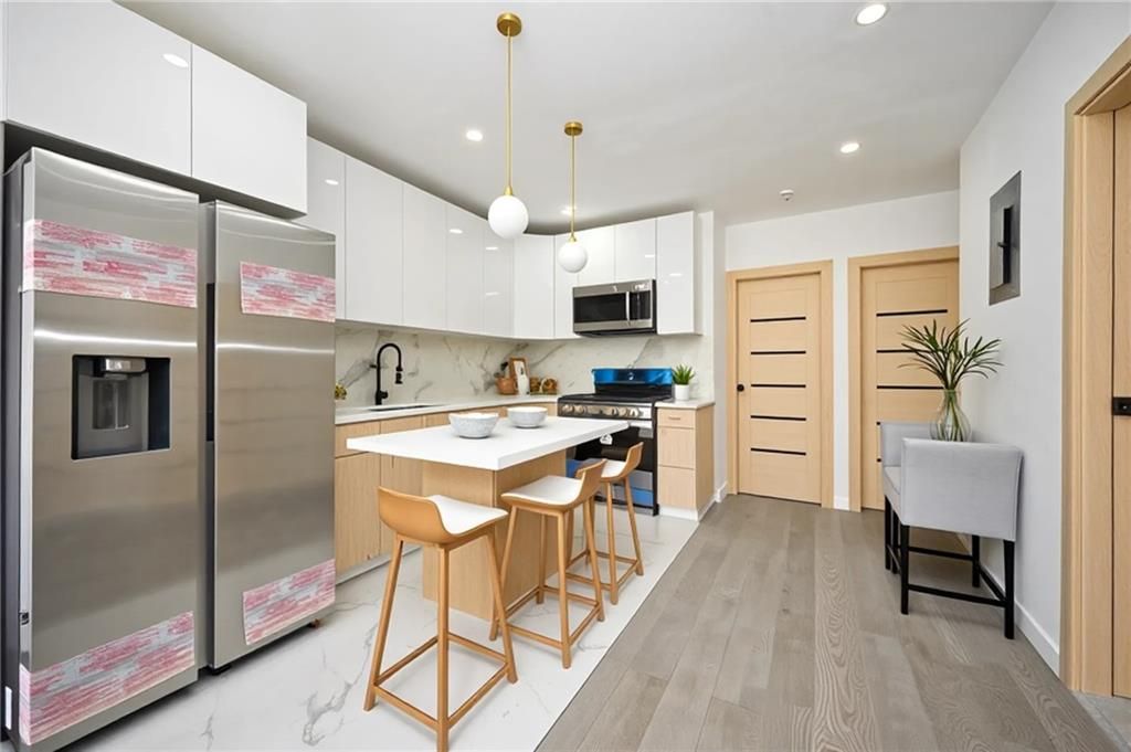 Photo of 1419 98th Street, Brooklyn, NY 11236 (MLS # 495435)