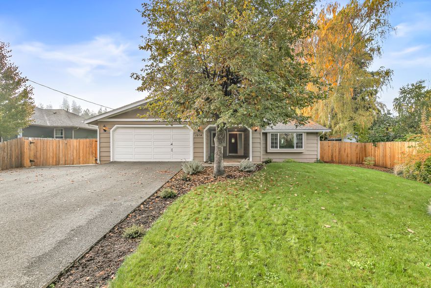 Looking for an updated/professionally remodeled single level home w/ an open floor plan in a suburb of Grants Pass? If so, this is the one for you! This charmer features 3 bedrooms, 2 bathrooms,1710 sq ft, new central heating system, chef's kitchen w/ large island, new kitchen appliances, & new cabinetry, large 0.23 acre lot (landscaped, fenced, & irrigation in the front yard), large covered patio, attached oversized 2 car garage, RV parking w/ 50 amp service, & much more! Seller spared no expense towards installing high end updates throughout such as new laminate flooring, new lighting & lighting fixtures, new interior/exterior paint, new water heater, & various other updates! Primary bedroom is spacious and offers his & her closets. On top of all this, you have your own private well. year home warranty included with a full price offer as well! This is a perfect opportunity for anyone looking to live a comfortable life in a low maintenance property!