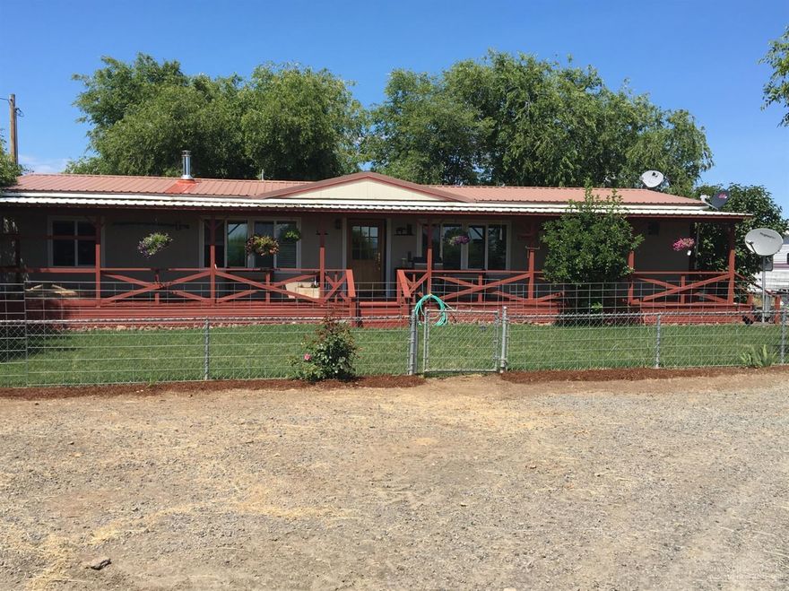 Spectacular Cascade Mountain Views on this 10 acre Horse Property. Newly updated 3 bedroom, 2 bathroom MFG home. New wood grain pergo floors throughout, fresh paint, and new carpet in the bedrooms. New certified wood-stove in Family Room. Large covered front deck overlooking fenced front yard with low maintenance landscaping. Second deck off the kitchen for entertaining. Koi pond and gazebo! Beautiful metal 7 stall horse barn with turn outs runs, and large tack room. Large shop, hay barn with loafing area, 3 covered 12x12 nobel panel horse shelters, large covered area with 2 large stalls, chicken house, storage building with dog kennel attached, outdoor arena, and round pen.