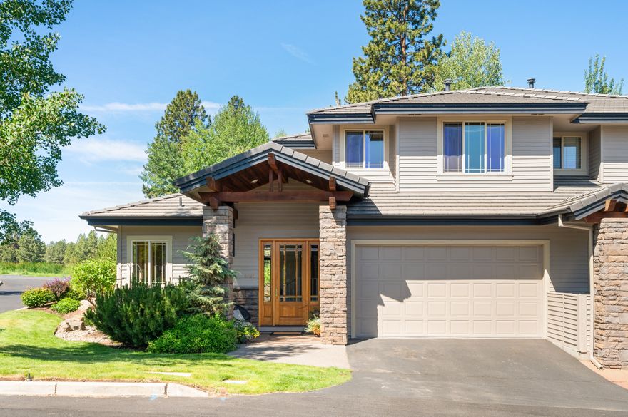 Light-filled Broken Top townhome with golf course views, southwestern exposure, and effortless low-maintenance living. This desirable end unit offers abundant natural light throughout the year. The open floor plan features a vaulted Great Room with gas fireplace, wood beam accents, floor-to-ceiling windows, and access to the charming deck and yard space - perfect for relaxing or entertaining. The well-appointed kitchen includes ample working space and newer stainless steel appliances. The adjacent dining area offers a built-in buffet with additional storage, ideal for entertaining. The Main Level Primary Suite features patio access and a luxurious bath with Quartz vanity, soaking tub, tile shower, and walk-in closet. Upstairs: two generous En-suite Guest Rooms and a versatile flex/work area providing comfort and flexibility. Attached 2-car garage. Exterior maintenance/landscaping included in HOA. Optional club membership offers golf, tennis, new pickleball courts, pool, and fitness center.