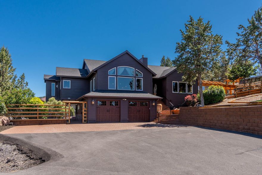 Stunning Powell Butte hobby farm. Gorgeous panoramic views of valley, Smith rocks and mountains. The three bedroom 2 1/2 bath Northwest Homestead on over 17 acres. Providing peaceful privacy.  Updated kitchen and master bath, home has elevator from ground level to living space.  New heat pump, furnace and tankless water heater in 2021. Beautiful 31 x 36' timber frame greenhouse. Enclosed finished 36 x 78' shop that is insulated and heated. Horse Barn complete with 12 x 12 stalls, tack room, and separate area. This home has endless potential and possibilities. A must see!--