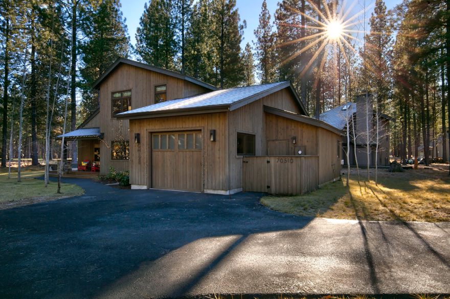 Don't miss this stunningly remodeled home in BBR. Updated in 2016, the home features four spacious bedrooms, each with an en suite bathroom, including a primary suite conveniently located on the main floor. The open-concept design allows the kitchen to flow into the great room, perfect for entertaining. The gourmet kitchen boasts soft-close cabinets, a six-burner propane range, soapstone countertops and a white glass backsplash. An oversized island includes a second sink and seating for four, while the entertaining bar has a beverage refrigerator. The bright great room, with floor-to-ceiling windows, offers stunning golf course views and a cozy propane fireplace. Step outside to the cedar deck, ideal for outdoor enjoyment. The garage features a finished attic for storage and a 240V outlet for EV charging. Overlooking the 7th fairway of Glaze Meadow Golf Course, this home is a short distance from the pool and recreation center. Schedule your viewing today!