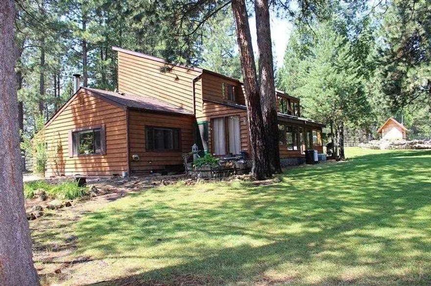 Unique, Peaceful Home 5+ Acres Pines & Aspen Surround 3 Bdr 2 Bth Custom Cedar Home. Features Include Granite Island With Gas Stove Top, Solarium Entry, Enclosed Hot Tub Deck, Master Suite With Enclosed Deck, Certified Wood Stove, Attached Garage, Heated Work Shop/In-out Kennel, Metal Equipment/Toy Storage, Greenhouse, Log Sided Sauna, Outdoor Shower, In-ground Sprinklers, New Pump And Septic Tank. Set Up For Horses With Stall/Paddock, Fenced & Cross Fenced Near Nat L Forest!