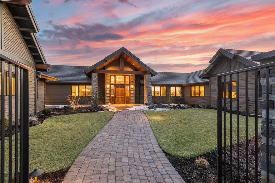 Nestled at the end of a quiet cul-de-sac, this single-level Northwest contemporary masterpiece offers a peaceful, quiet respite from city life. Uniquely positioned for seclusion and natural surroundings the seller commissioned renowned Norman Building & Design whose attention to quality and craftsmanship is immediately evident. Cedar cathedral ceilings and white oak flooring create a bond between the home and surrounding acreage. The light-filled kitchen includes professional-grade Thermador appliances, custom alder cabinetry and a custom pantry. The Primary bedroom suite is just steps away from the dedicated gym. Additional features include en suite baths for all bedrooms, an attached casita, courtyard entry, extensive deck with heating, dog run, multiple garages, extensive built-ins and RV space. This stunning location was selected for its close proximity to downtown Bend, the golf courses of Tetherow and Broken Top, skiing, hiking and more.