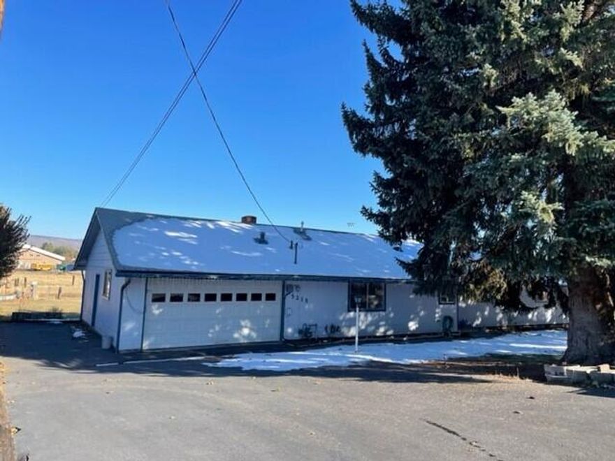 Well cared for home in Suburbs on Dead End Street! Home has 4 nice sized bedrooms, 2 baths, Living Room plus large Sun Room, Kitchen with lots of storage and newer F/A Gas Heat and A/C Systems.  Outside you will enjoy the massive back deck and the .41 acre lot.  Home has 2069 SF, 2 car garage with a small work shop area in the back, lots of storage throughout home.