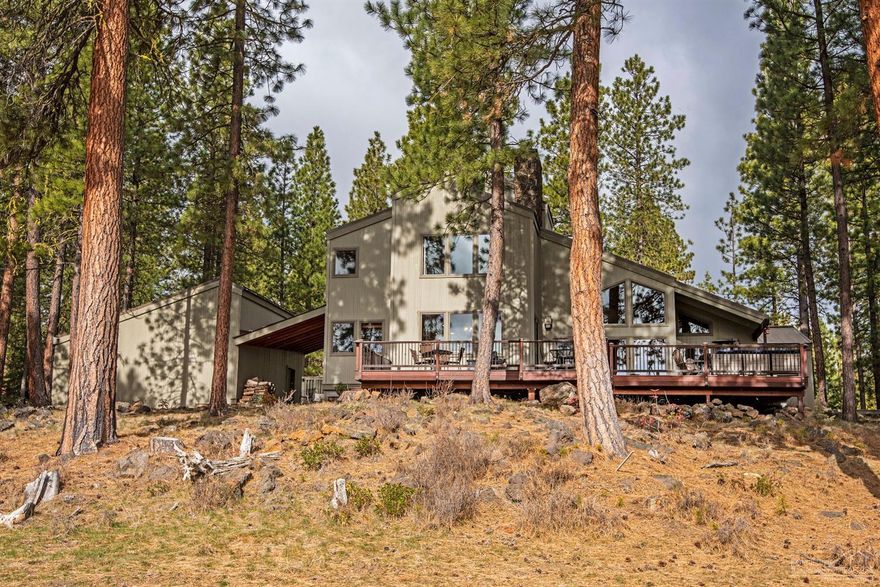 GH 47, unbelievable setting, enviable location. Sit on the huge mahogany deck of this Black Butte classic for 5 minutes and you won't want to leave. One of the most dramatic, peaceful and private settings on the Ranch. From its elevated perch, GH47 looks up, down and across the Big Meadow 11th fairway and green, where Fawn Lake forms the jewel in the evergreen and aspen lined backdrop. Homes are visible only to the left and right - the nearest homes across the fairway are over 1/2 mile away beyond the Ranch's signature meadow and horse pastures. Over $37,000 in rental income in 2019. Sold beautifully furnished.