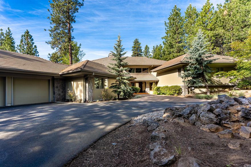 Stunning 4610 sq.ft home in Black Butte Ranch. This house, with 4 en suite bedrooms and an en suite office (all bathrooms have radiant floor heat), & a yoga room has been completely remodeled. The just under an acre & a half land sits at the far side of Black Butte Ranch and looks out onto forested property that is in a trust making the house private, quiet and serene.  Open floor plan with high ceilings, a gourmet kitchen, a wood burning fireplace in the living room & newly furnished decks all across the back of the house for the ultimate in-home entertaining. Immaculately kept and maintained – freshly painted in 2019. Limestone and wood floors. Skylights and large scale windows and sliding doors create natural light throughout. Beautifully landscaped with old growth trees & rock outcroppings. Oversized garage. 3 Heat Pumps, 3 Furnaces, 3 Water Heaters & radiant floor heat. This house & property is special – the ultimate in Black Butte Ranch and Central Oregon living.