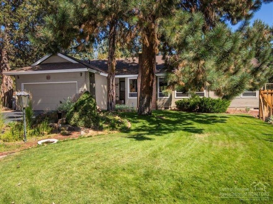 Immaculate home in a quiet, peaceful neighborhood. This cozy single level home has nice wood accents, vaulted ceilings, and a wood burning fireplace. Spacious kitchen w/ tons of cupboard and counter space, extra bonus room that could be used as a bedroom, and an attached 2 car garage. The extremely private, .46 acre lot is beautifully landscaped, fully fenced, w/ R.V. parking, and extra storage sheds . Come relax or entertain on the 600 sq ft deck and enjoy the serenity of the large water feature!