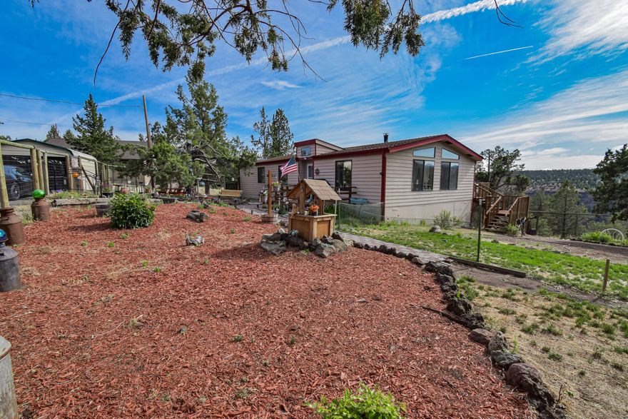 Would you look at those mountain views! Right off your porch, enjoy the beautiful peaceful view of the Sisters mountains. If you have been looking for your own affordable slice of central Oregon this is it. This home features vaulted ceilings, large master suite, lots of light, skylights, a open concept and has had some updates. A brand-new septic system was installed just over a year ago and the HVAC system has also been updated in the recent past. On the property you will find a metal car port, hobby shed, and a fenced garden. Only 15 min to HWY 97! Don't miss out on your own slice of the Central Oregon life.